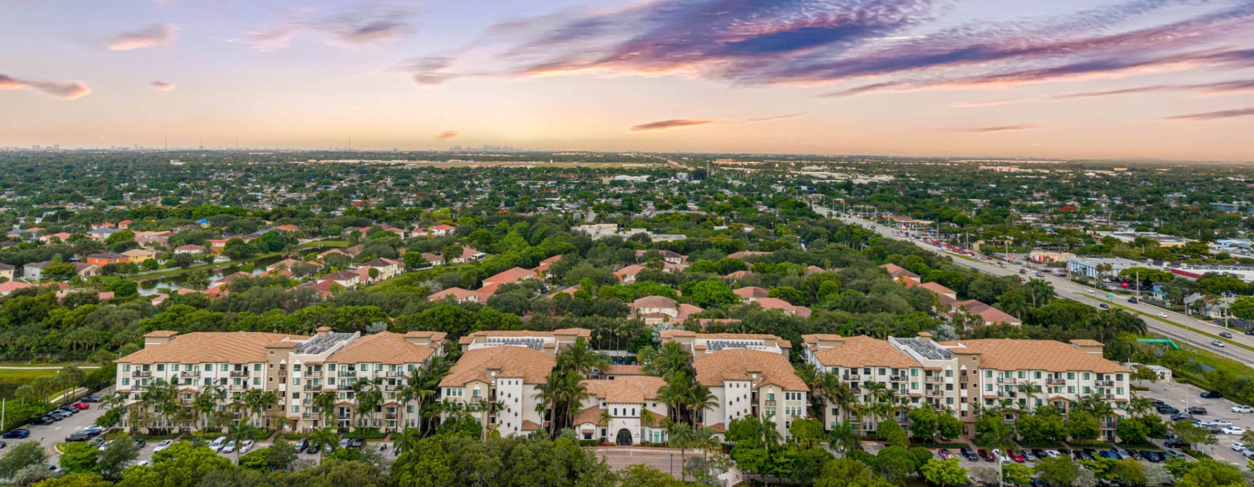 buildings under a sunset