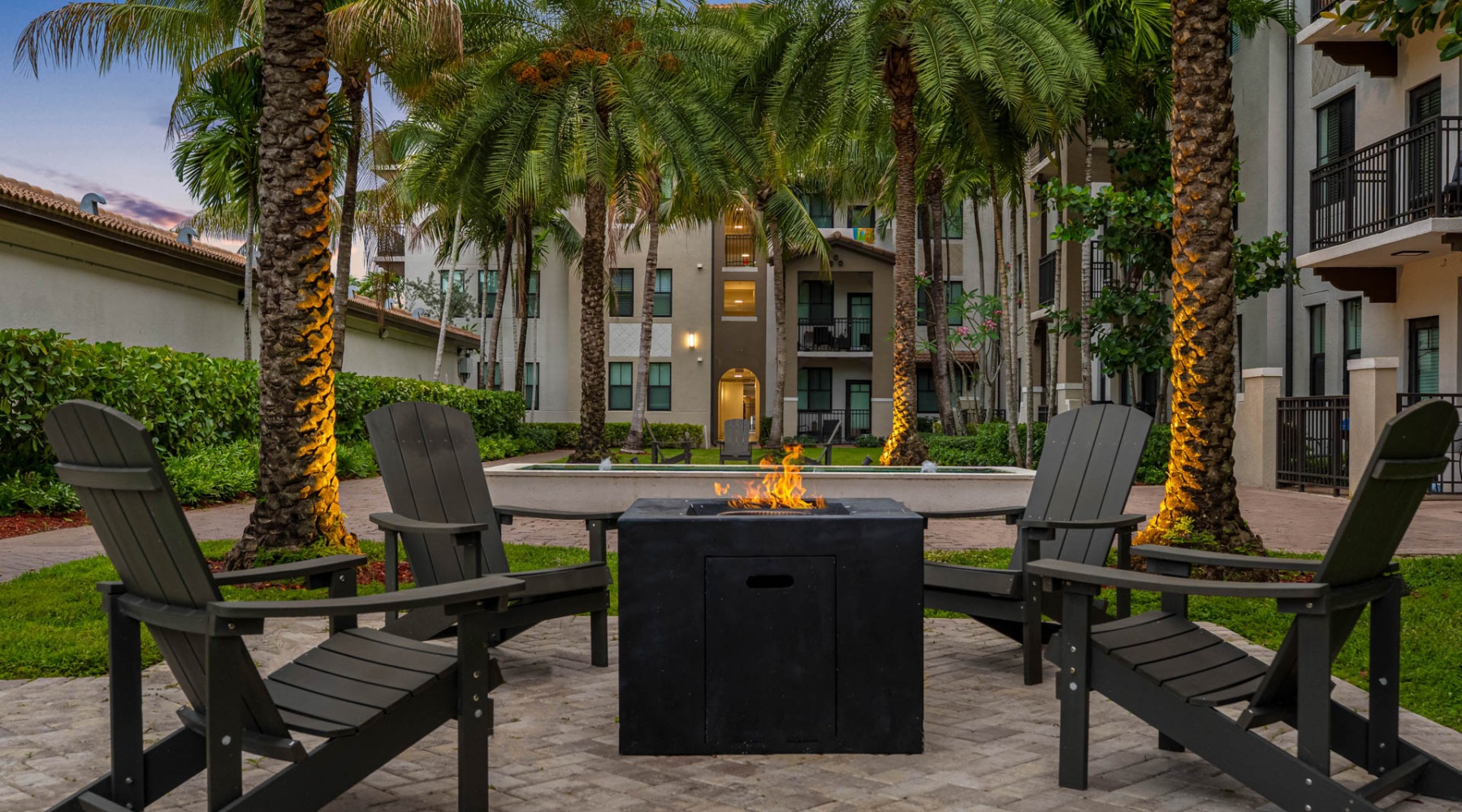 a fire pit near trees